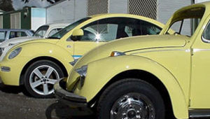 1969 Beetle sits next to a New Beetle.